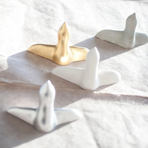 Beautiful wall hooks handmade in different shape and colours: golden, silver, white, grey