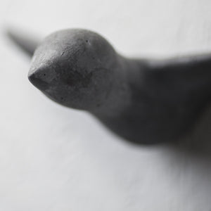black concrete wallhooks in the shape of birds, unique and genuine handamde in vienna with love and black concrete