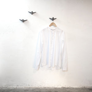 wandhaken aus vögeln für hemden und andere garderobe, wall hooks birds symbol concrete and handmade in vienna, austria