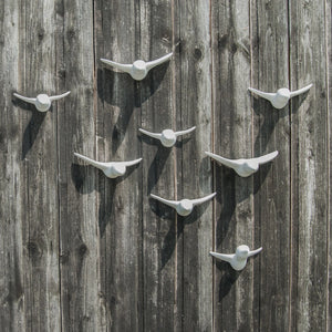 Flock of birds made of ceramic in astral white to easily adjust your home and house